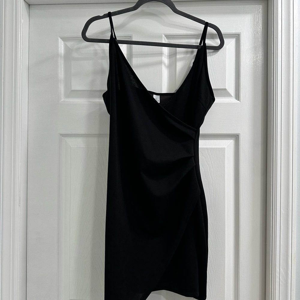 Asymmetrical bodycon mini dress
Black Women's Dress